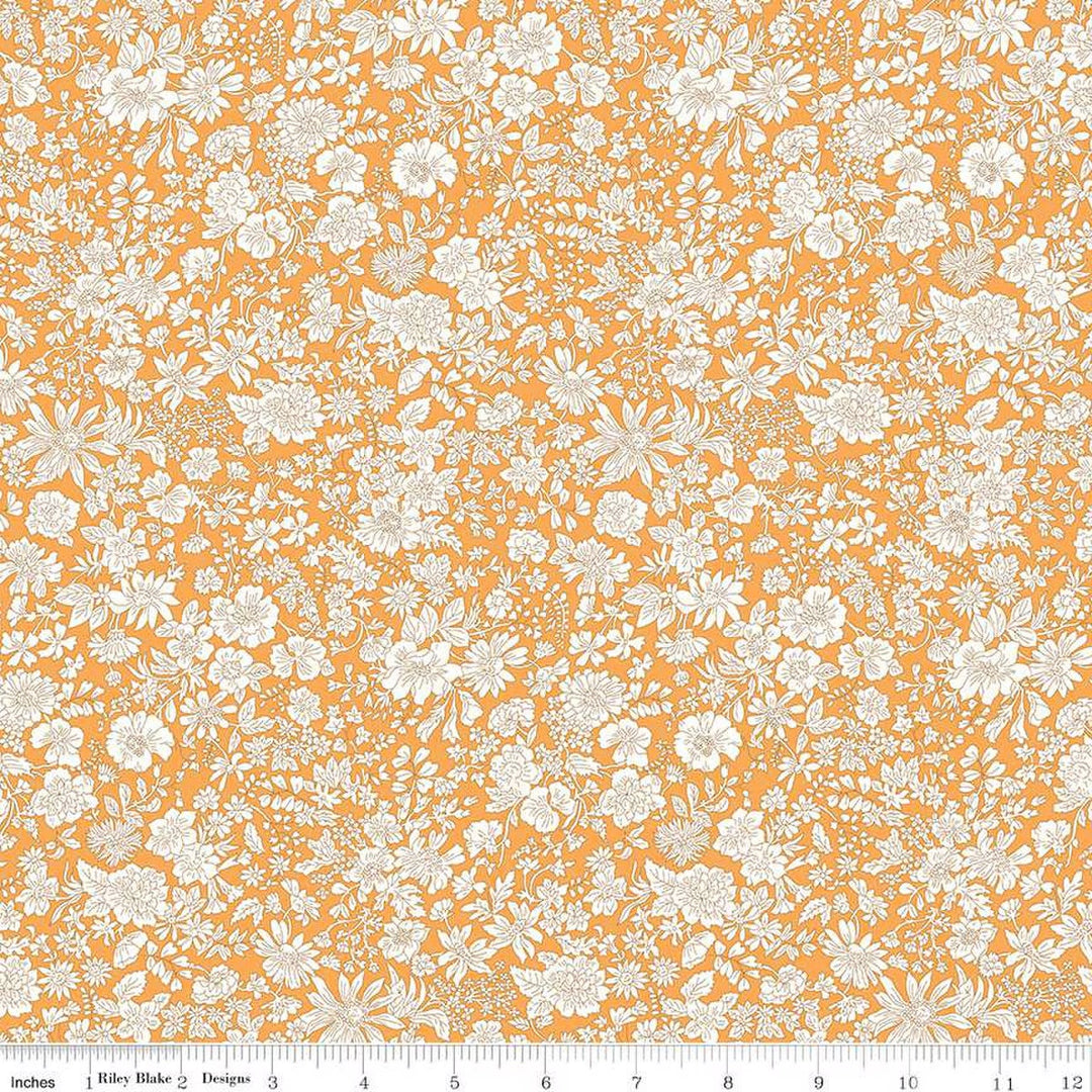 A closeup shot of the quilting fabric pattern called Saffron, part of Liberty Fabric's Emily Belle fabric collection by Riley Blake. SKU is 01666402A.