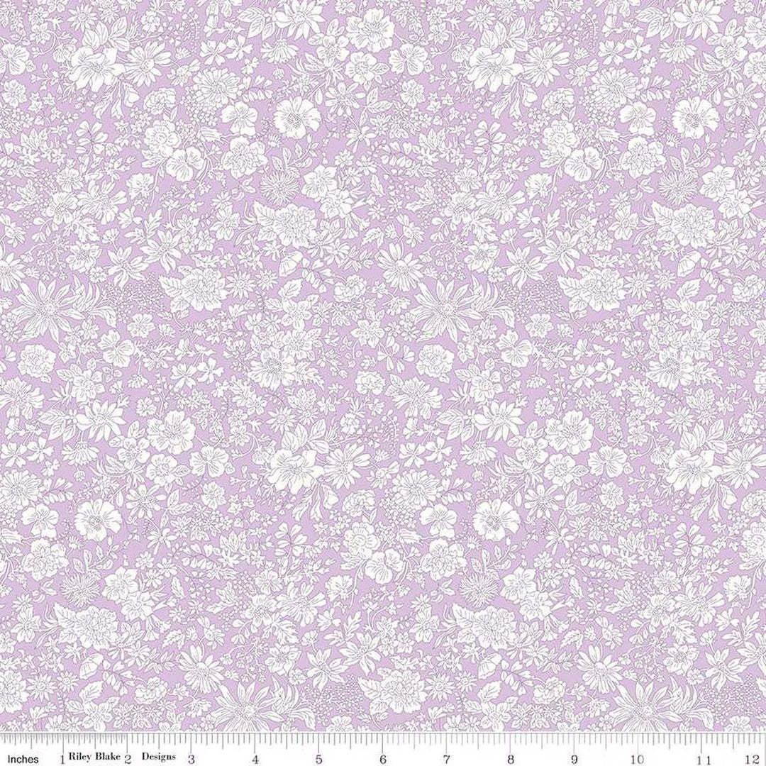 A closeup shot of the quilting fabric pattern called Violet, part of Liberty Fabric's Emily Belle fabric collection by Riley Blake. SKU is 01666403A.