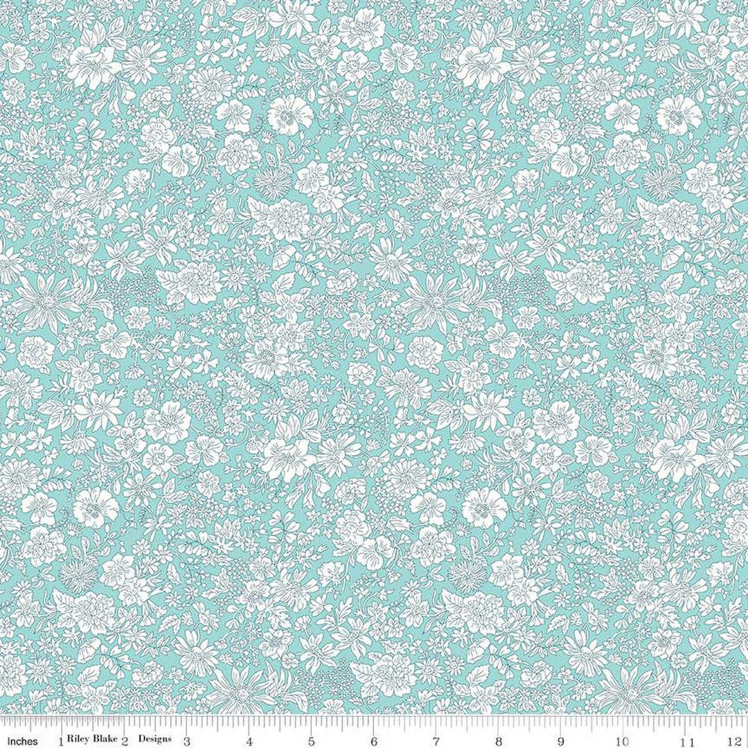 A closeup shot of the quilting fabric pattern called Mermaid, part of Liberty Fabric's Emily Belle fabric collection by Riley Blake. SKU is 01666410A.