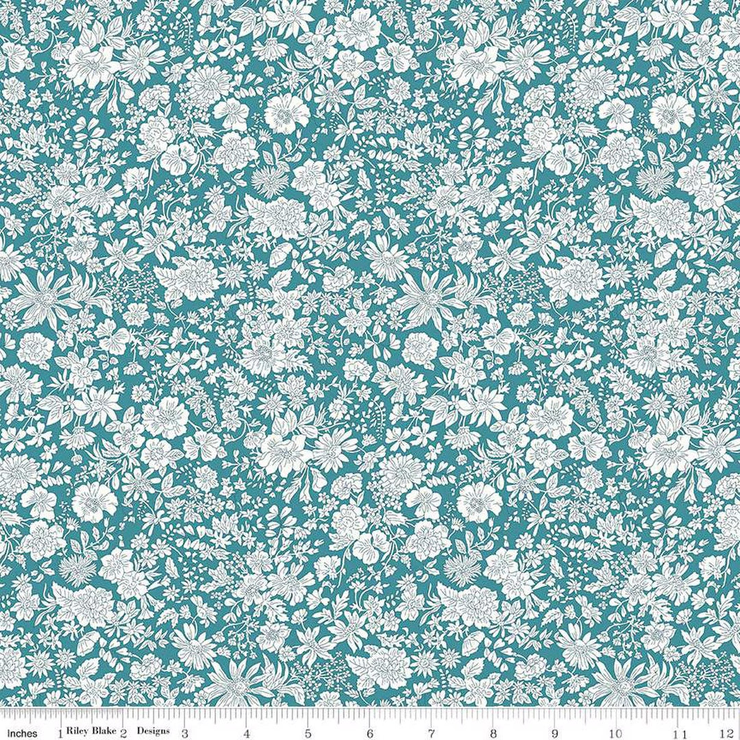 A closeup shot of the quilting fabric pattern called Peacock, part of Liberty Fabric's Emily Belle fabric collection by Riley Blake. SKU is 01666413A.