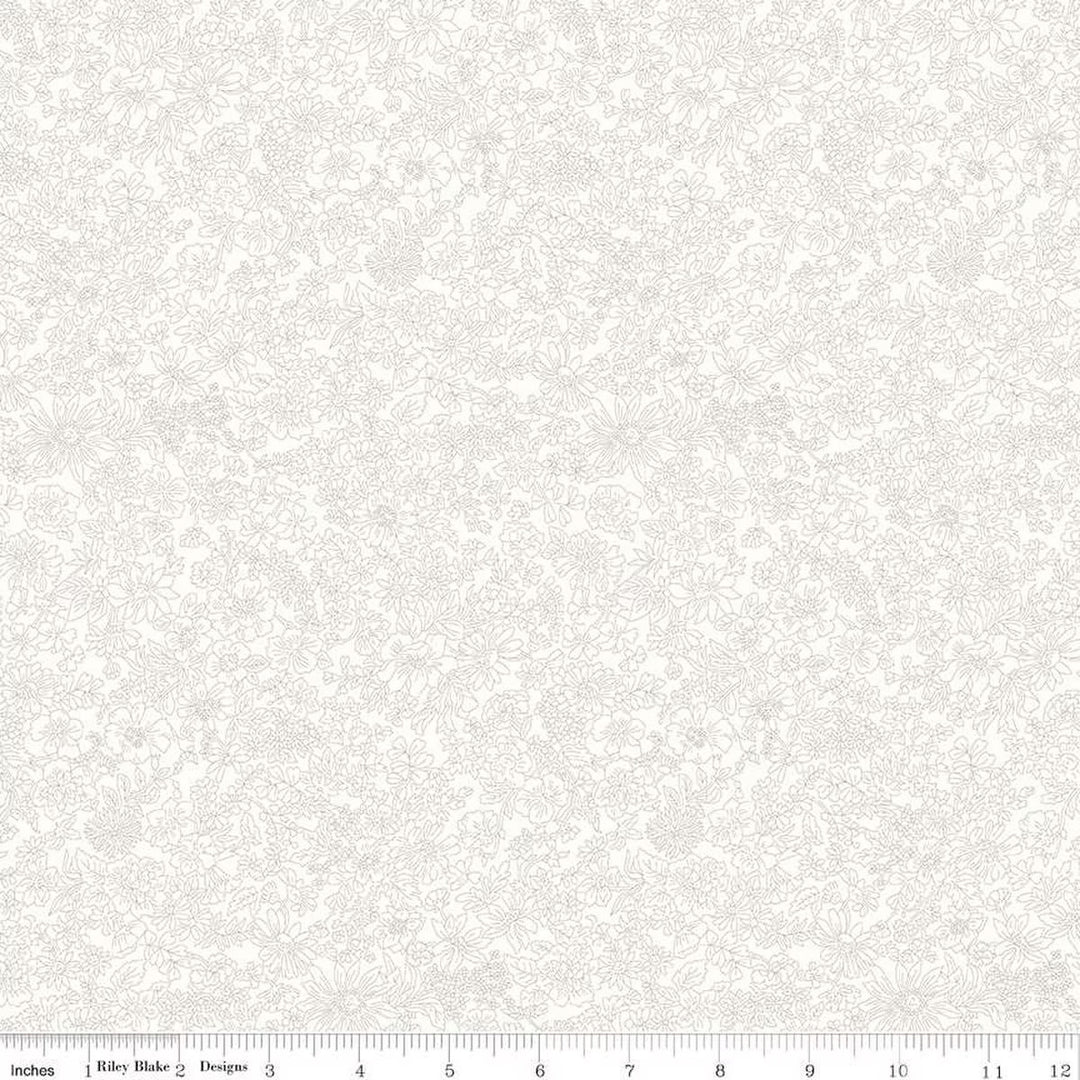 A closeup shot of the quilting fabric pattern called Ivory, part of Liberty Fabric's Emily Belle fabric collection by Riley Blake. SKU is 01666416A.