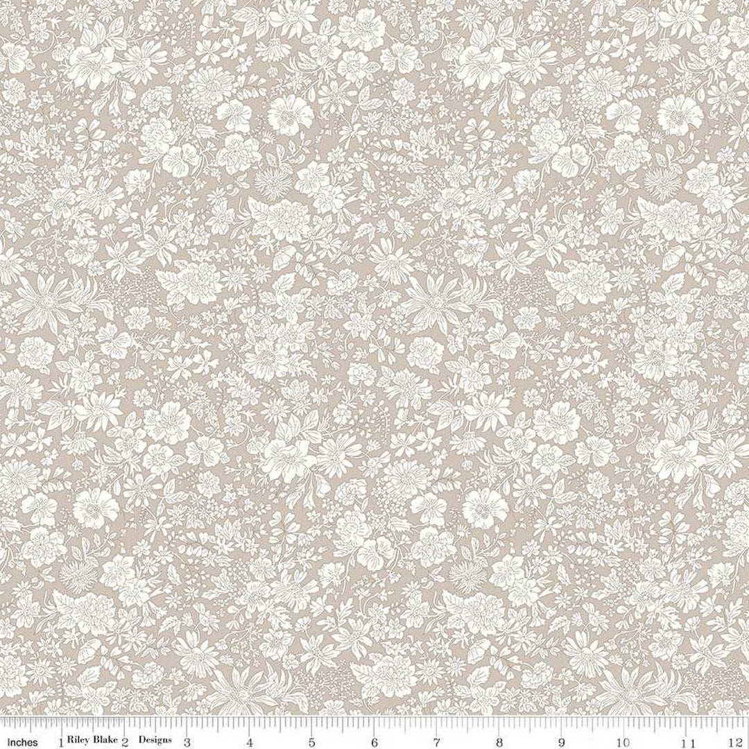 A closeup shot of the quilting fabric pattern called Oatmeal, part of Liberty Fabric's Emily Belle fabric collection by Riley Blake. SKU is 01666419A.