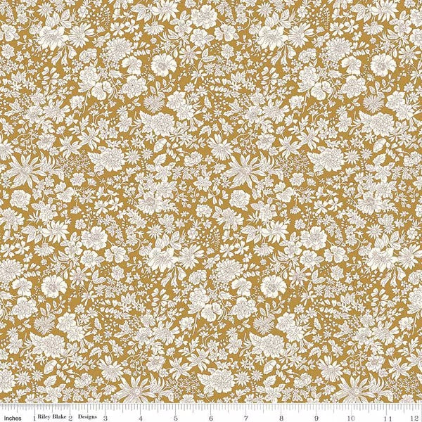 A closeup shot of the quilting fabric pattern called Golden Ochre, part of Liberty Fabric's Emily Belle fabric collection by Riley Blake. SKU is 01666431A.