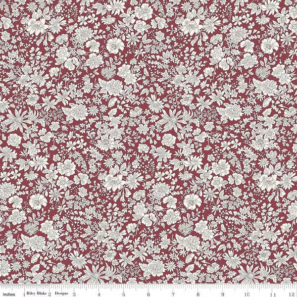 A closeup shot of the quilting fabric pattern called Claret, part of Liberty Fabric's Emily Belle fabric collection by Riley Blake. SKU is 01666435A.