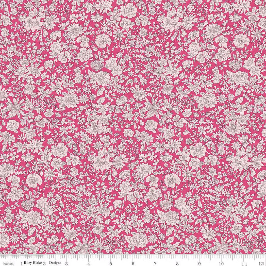 A closeup shot of the quilting fabric pattern called Magenta, part of Liberty Fabric's Emily Belle fabric collection by Riley Blake. SKU is 01666438A.