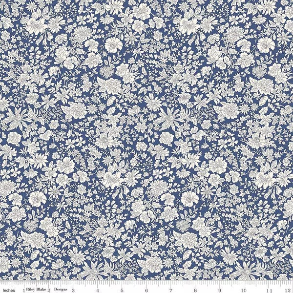 A closeup shot of the quilting fabric pattern called Sapphire, part of Liberty Fabric's Emily Belle fabric collection by Riley Blake. SKU is 01666441A.