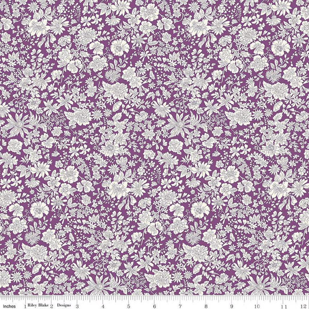 A closeup shot of the quilting fabric pattern called Plum, part of Liberty Fabric's Emily Belle fabric collection by Riley Blake. SKU is 01666443A.