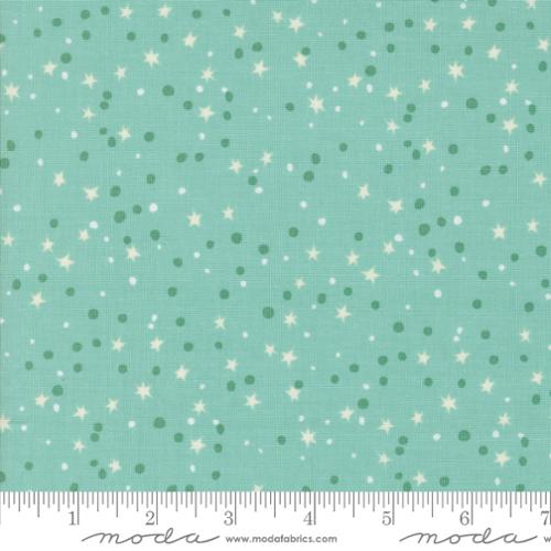 A closeup shot of the quilting fabric pattern called Stars Stars, designed by Stacy Iest Hsu, in the blue nebula colorway. The SKU is 20955 17.