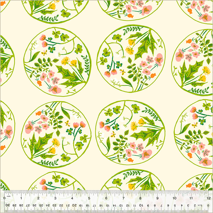 A closeup shot of the quilting fabric pattern called Floral Wreaths, designed by Heather Ross, in the cream colorway. The SKU is 40928D-5.