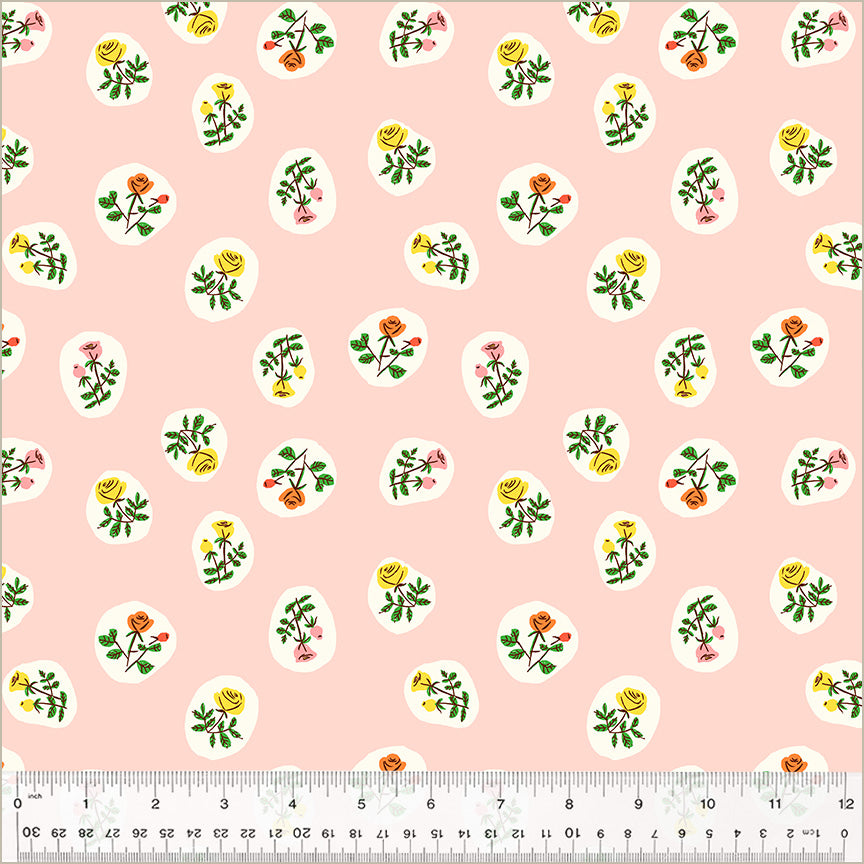 A closeup shot of the quilting fabric pattern called Bouquet, designed by Heather Ross, in the blush colorway. The SKU is 40930D-4.