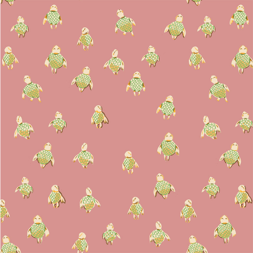 A closeup shot of the quilting fabric pattern called Sea Turtles, designed by Heather Ross, in the rose colorway. The SKU is 52150-16.