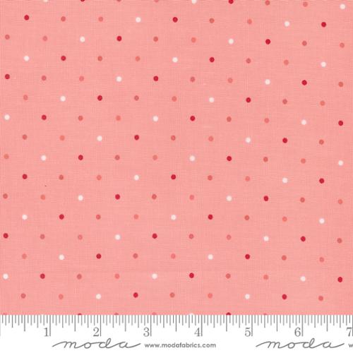 A closeup shot of the quilting fabric called Magic Dot, designed by Lella Boutique, in the pink lemonade colorway. The SKU is 5230 34.