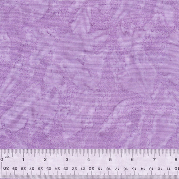 A closeup shot of the quilting fabric pattern called BeColourful Blush, designed by Jacqueline de Jonge, in the lovely lilac colorway. The SKU is BCB12Q-X.