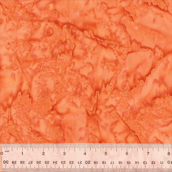 A closeup shot of the quilting fabric pattern called BeColourful Blush, designed by Jacqueline de Jonge, in the sunset colorway. The SKU is BCB6Q-X.