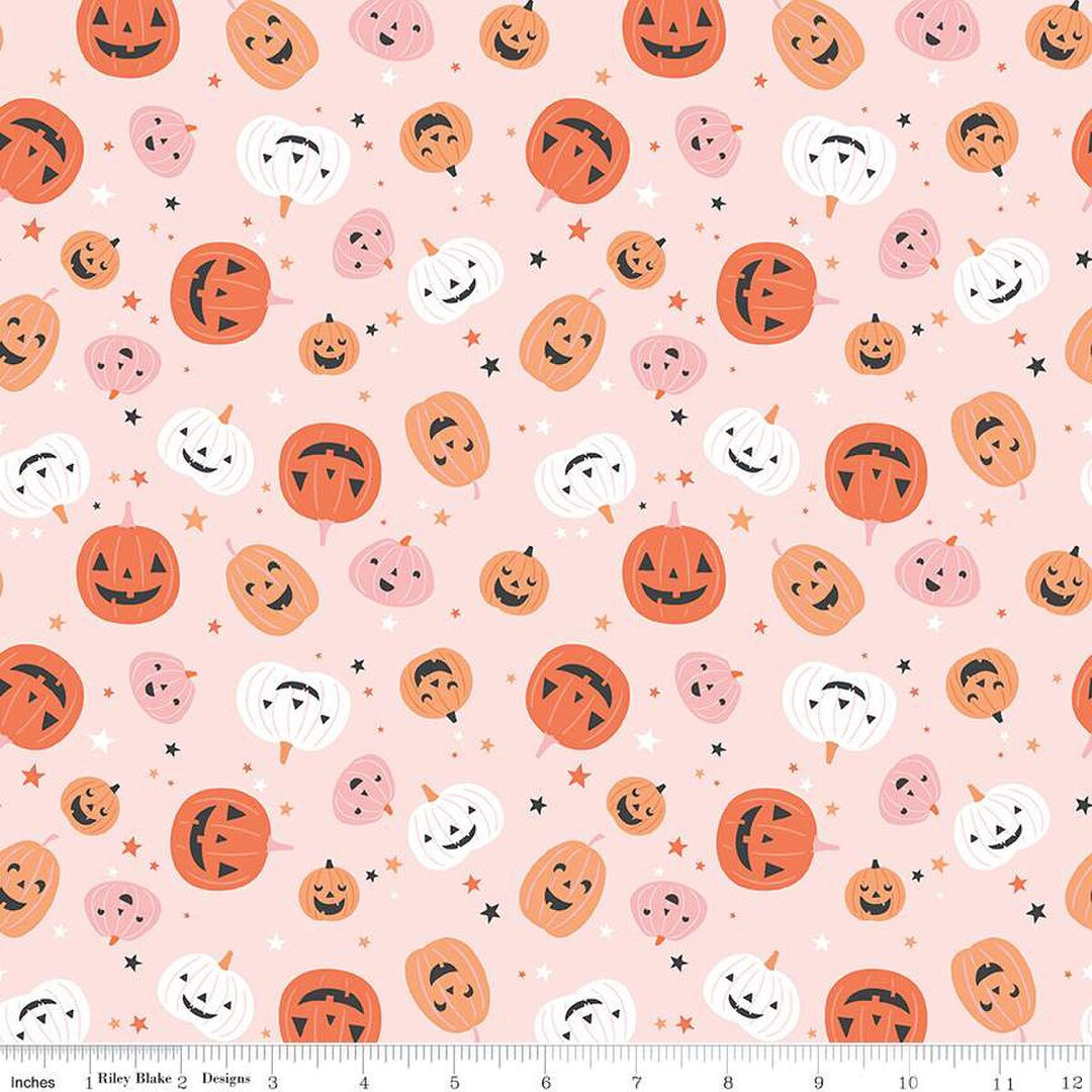 A closeup shot of the quilting fabric pattern called Pumpkins, designed by My Mind's Eye for Riley Blake, in the blush colorway. The SKU is C16031-BLUSH.