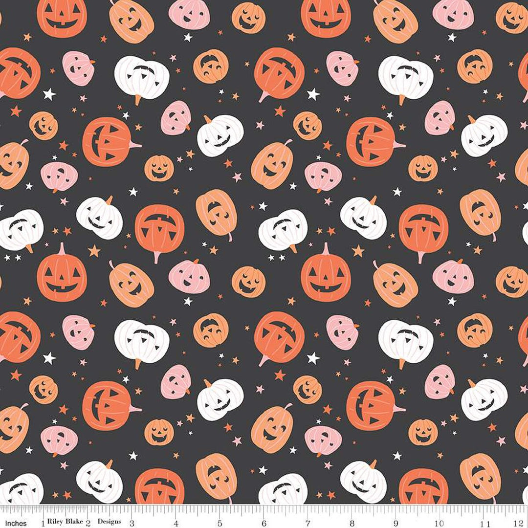 A closeup shot of the quilting fabric pattern called Pumpkins, designed by My Mind's Eye for Riley Blake, in the charcoal colorway. The SKU is C16031-CHARCOAL.