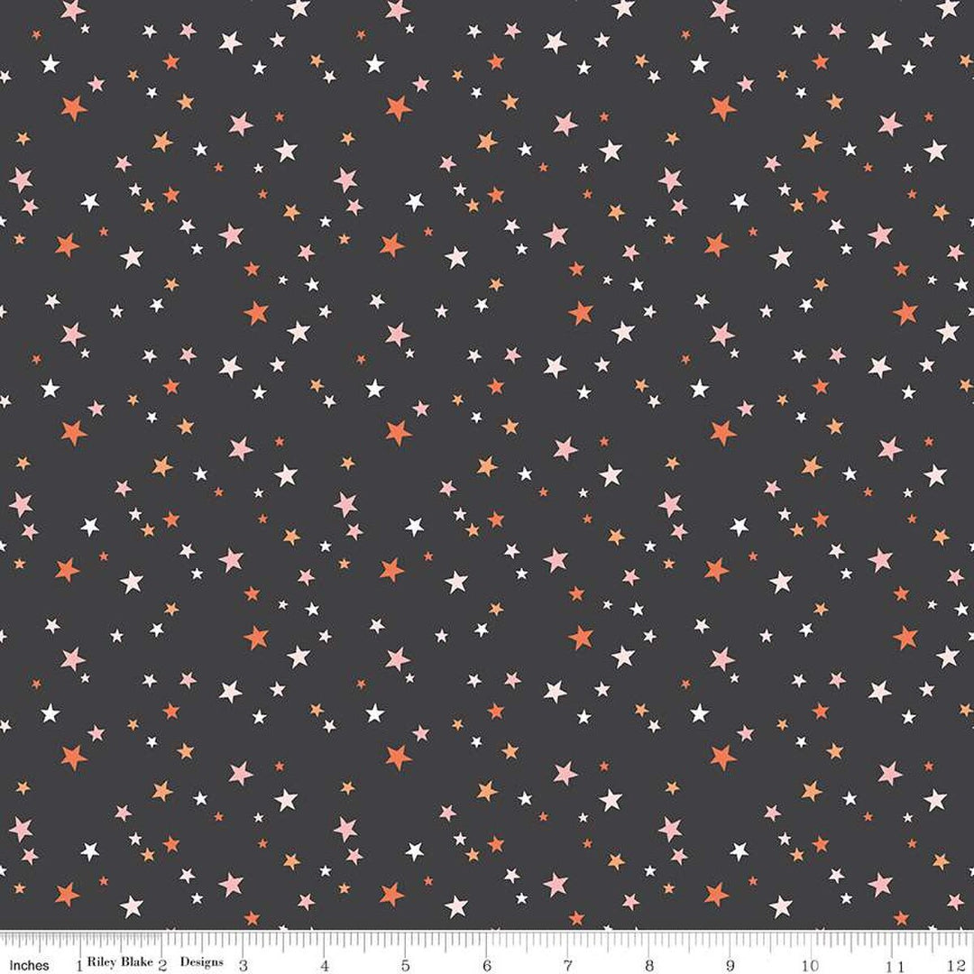 A closeup shot of the quilting fabric pattern called Stars, designed by My Mind's Eye for Riley Blake, in the charcoal colorway. The SKU is C16037-CHARCOAL.