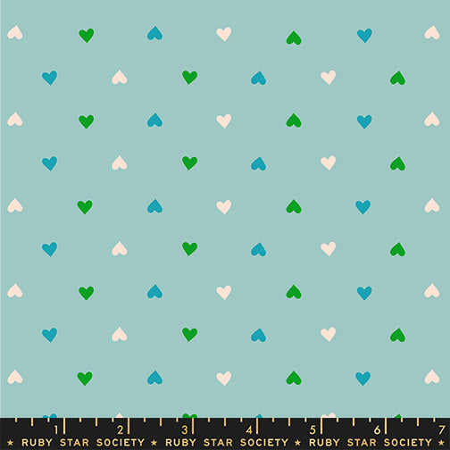 A closeup shot of the quilting fabric pattern called Hearts, designed by Melody Miller for Ruby Star Society, in the turquoise colorway. The SKU is RS0091 20.