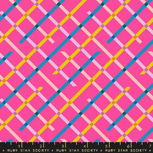 A closeup shot of the quilting fabric pattern called Off Grid, designed by Rashida Coleman Hale, in the playful colorway. The SKU is RS1104 13.