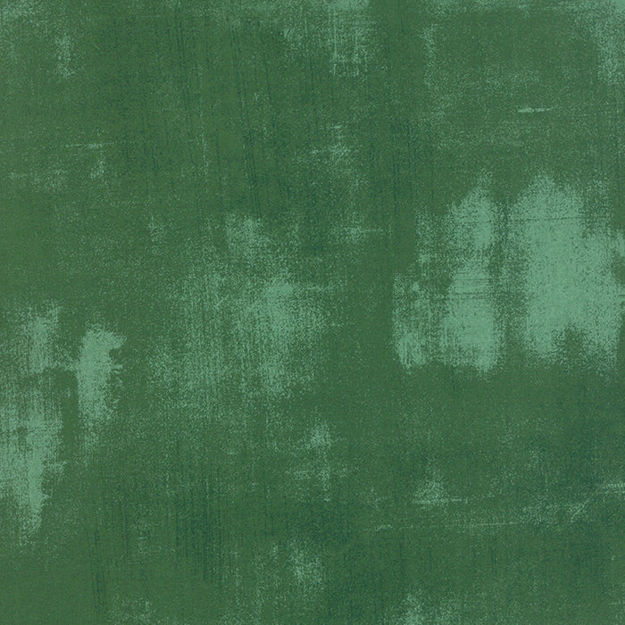 Cotton quilting fabric pattern called 'Grunge in Evergreen'. Part of the 'Grunge Basics' fabric collection. Designed by Basic Grey for fabric company Moda Fabrics. SKU: 30150 266. 44-45 inch width.