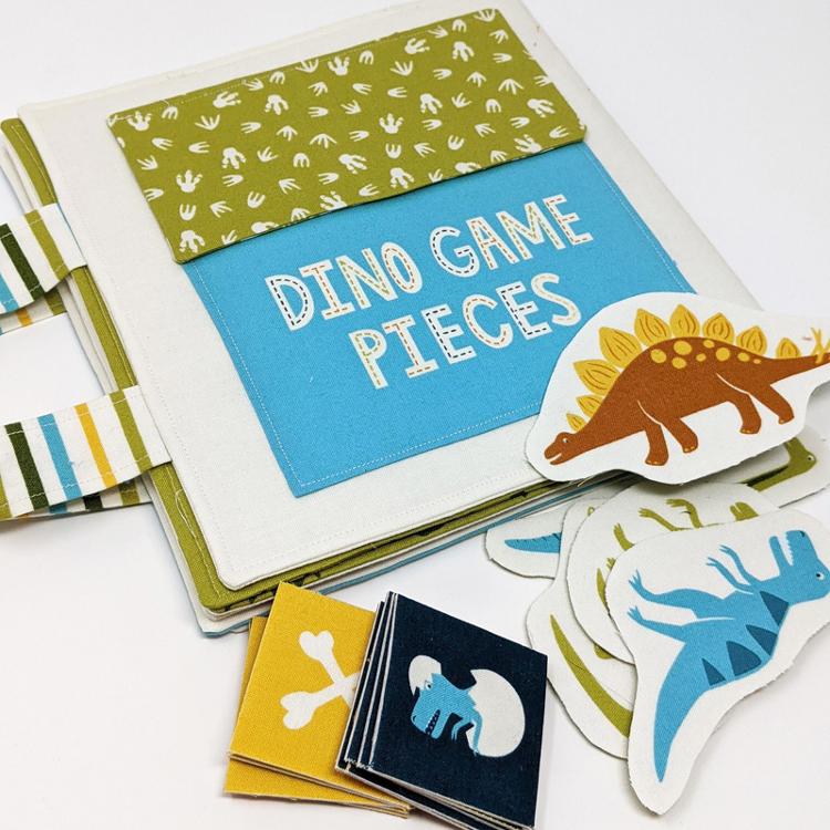 Stomp Stomp Roar Dino Game Book  36in Fabric Panel by Stacy Iest